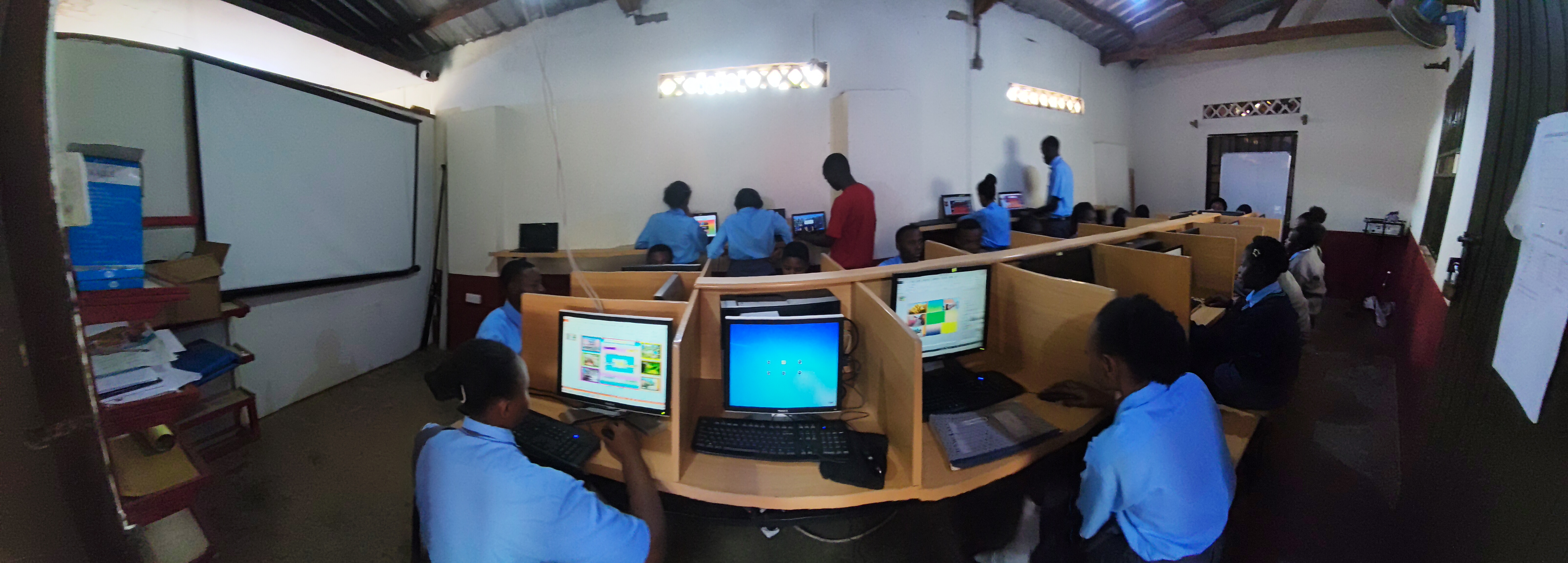 Students working at individual stations in the Everlight College computer lab.